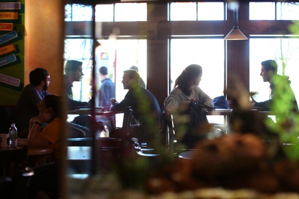 Students take a break inside the Dog Lane Cafe in Downtown Storrs